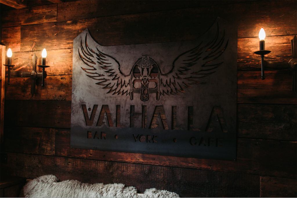 Metal logo on wall of Valhalla bar, York